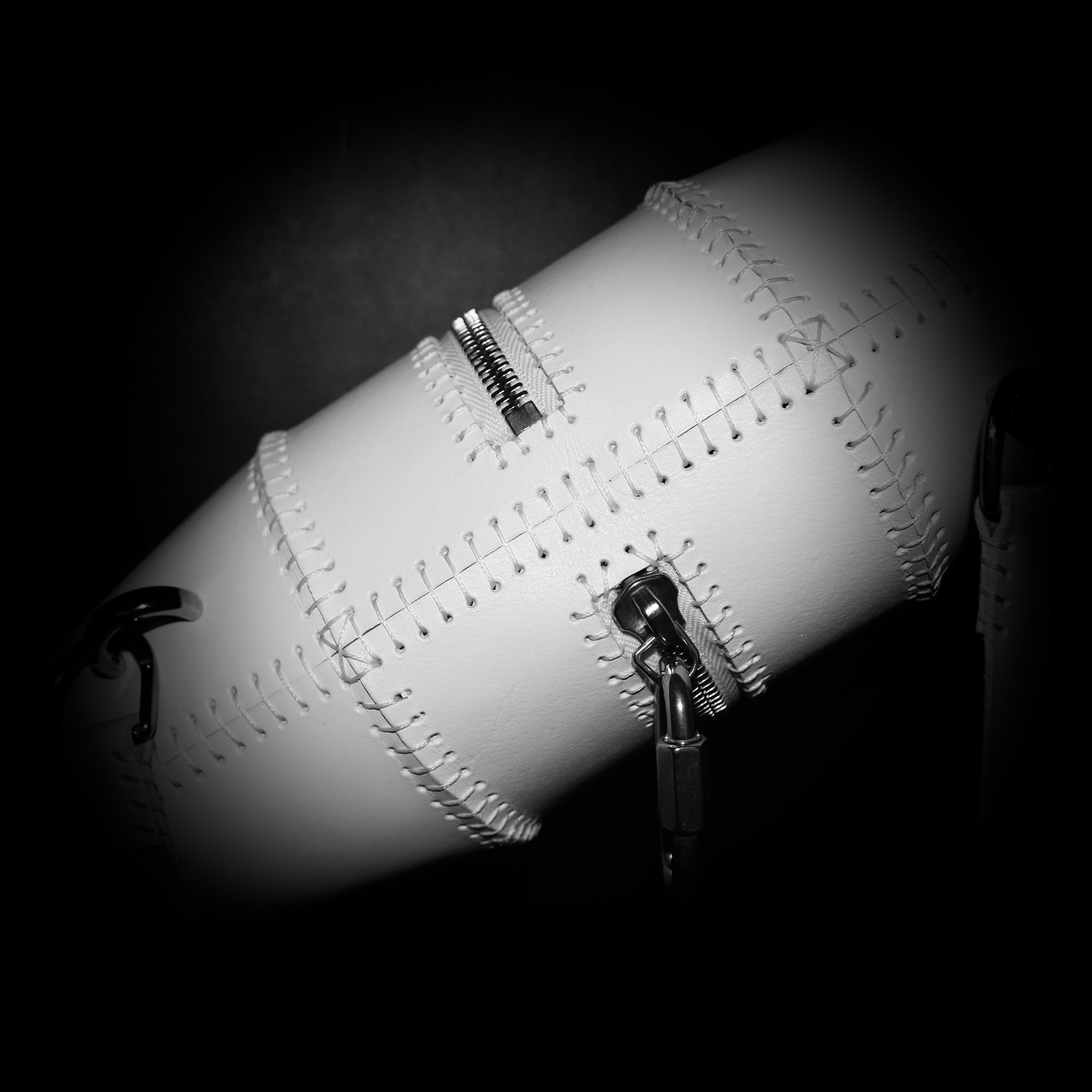 DOUBLE CONE SLING BAG